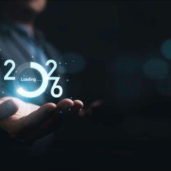 Businessman,Holding,Virtual,Downloading,2026,Number,With,Blue,Bokeh,Background